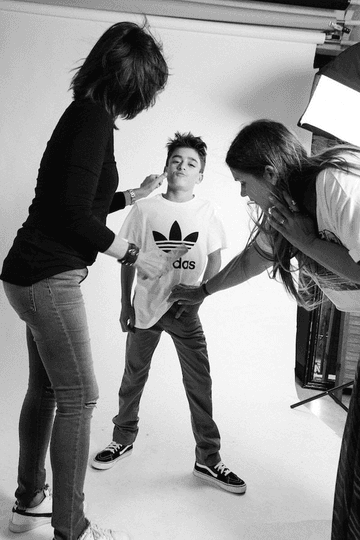 Behind-the-scenes wardrobe and makeup preparation